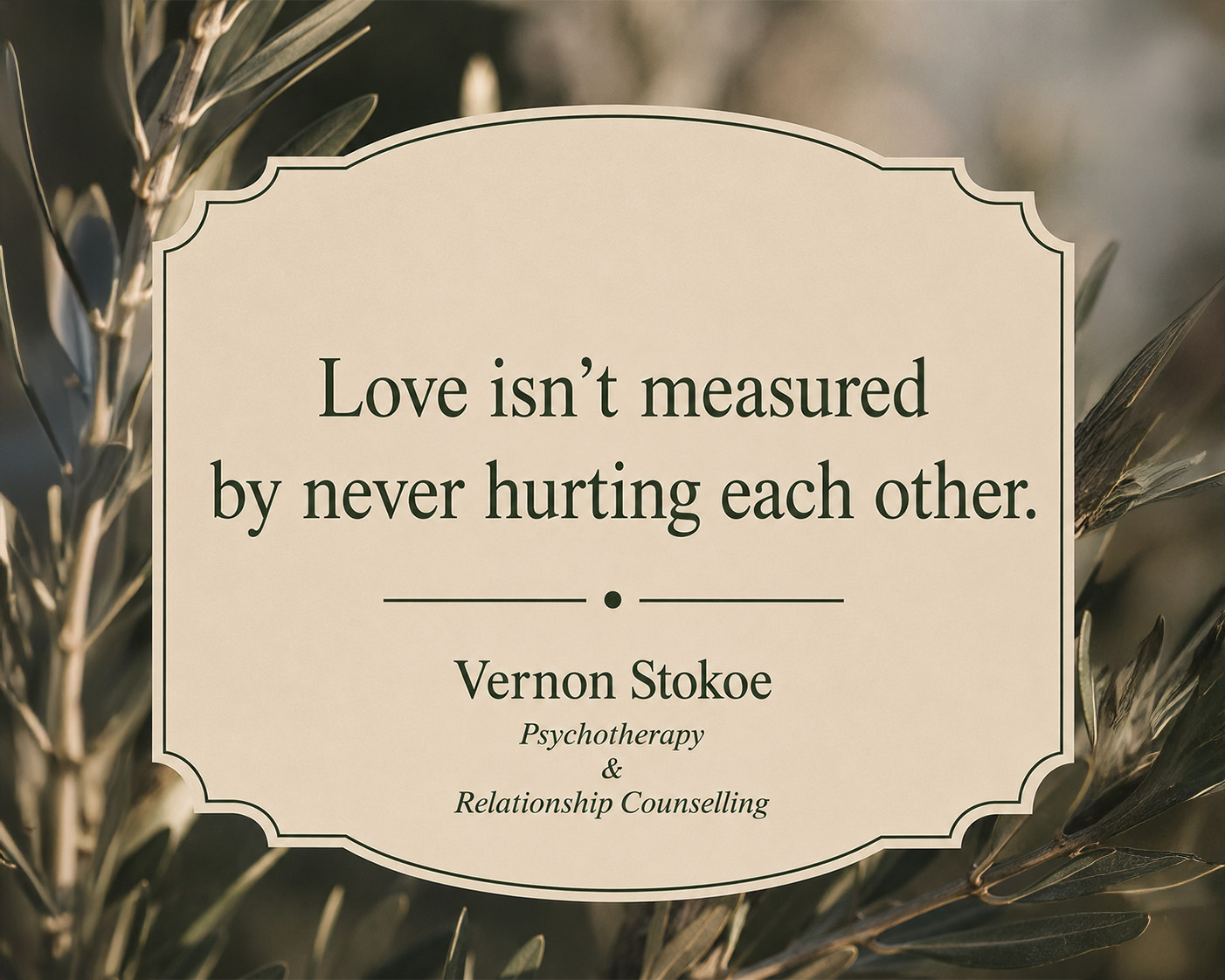 Relationship counselling quote graphic with olive branches and soft natural lighting, featuring the text “Love isn’t measured by never hurting each other.”