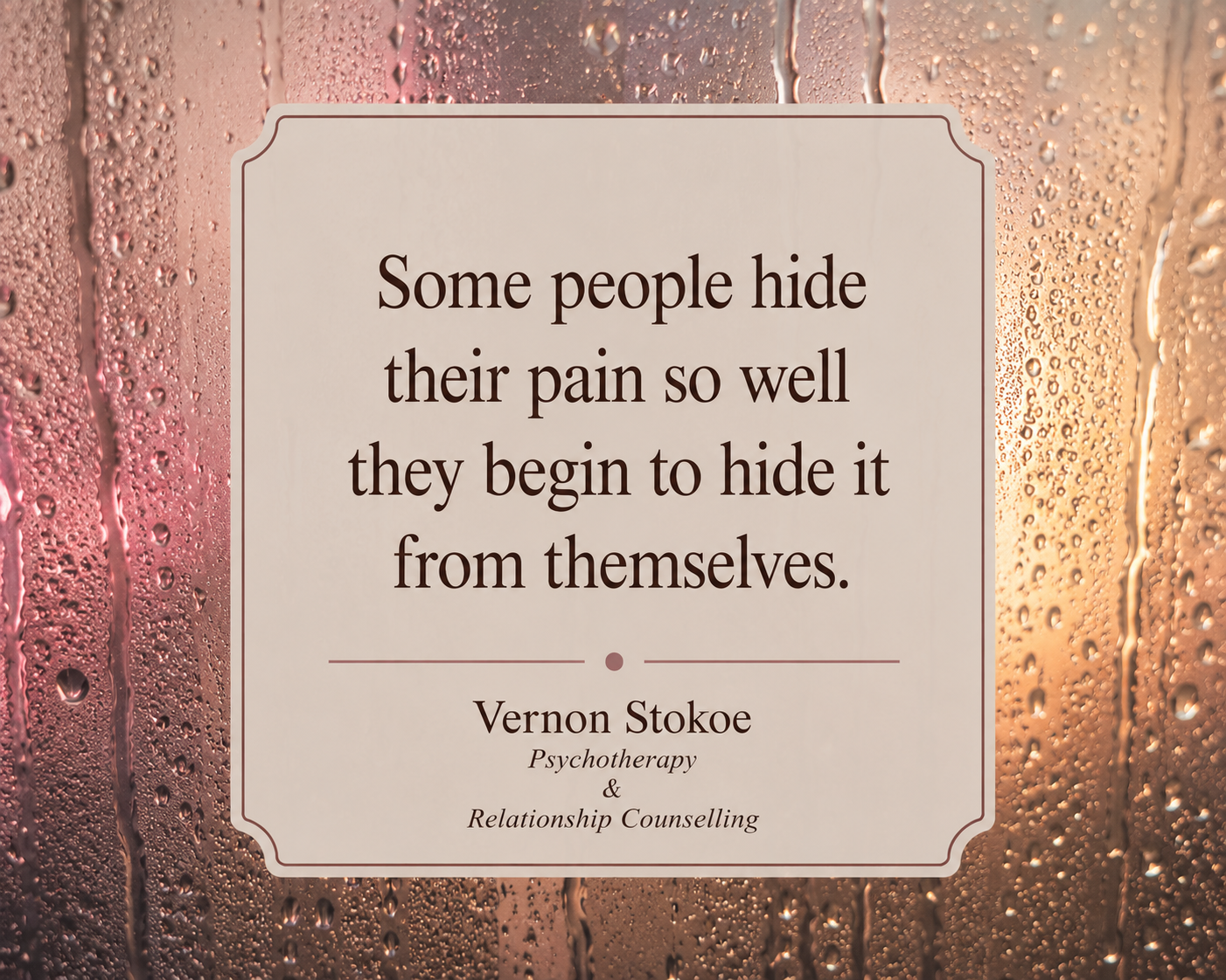 Psychotherapy quote graphic featuring condensation on glass with warm pink and amber lighting, displaying the text “Some people hide their pain so well they begin to hide it from themselves.”